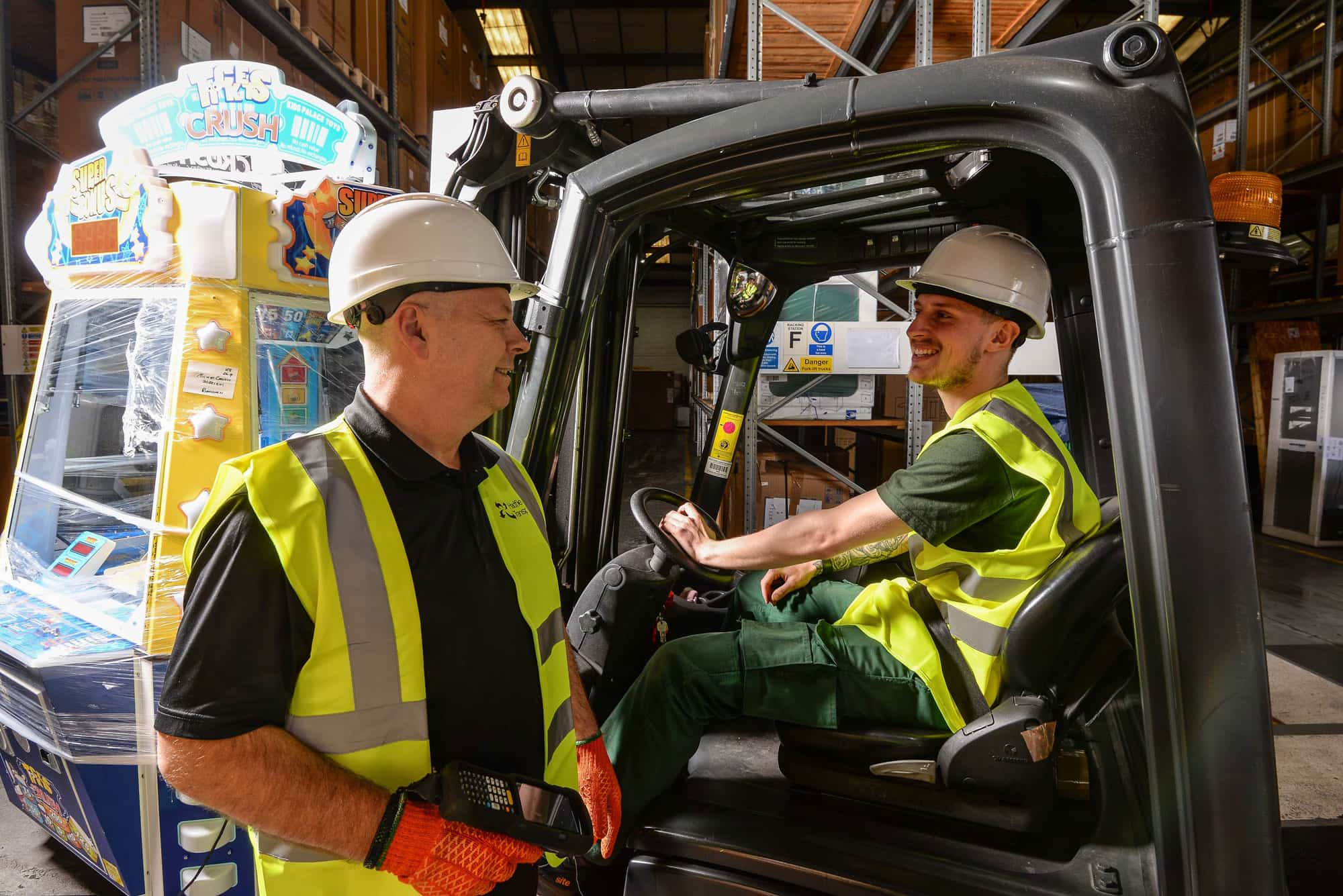 Team members talking in warehouse