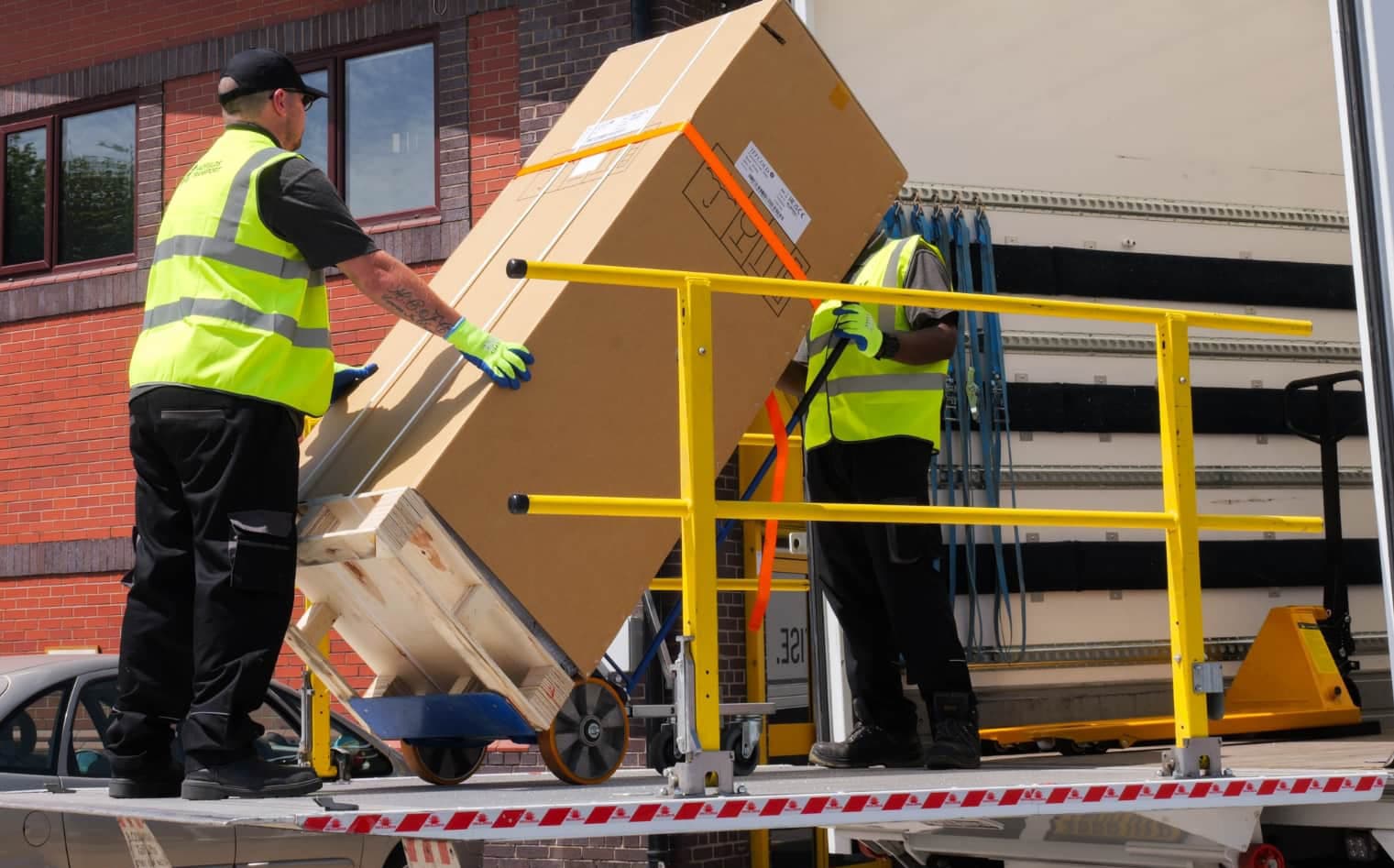 Hadfields workers on vehicle