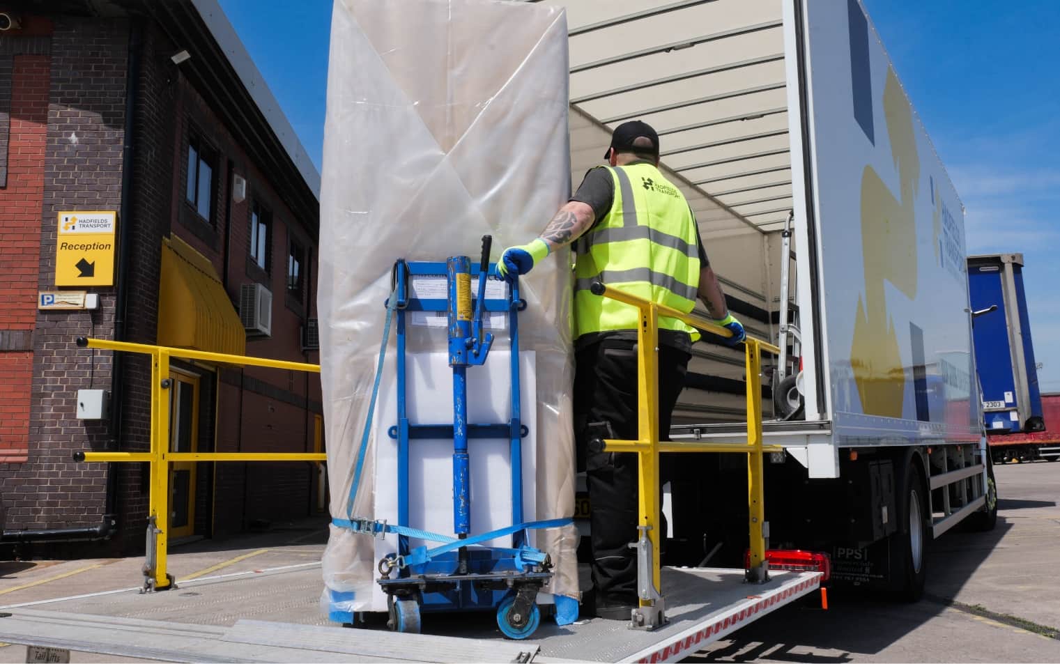 Hadfields workers on vehicle